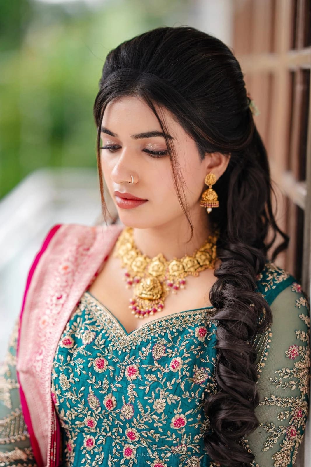 Behind the scenes of a media production makeup session.